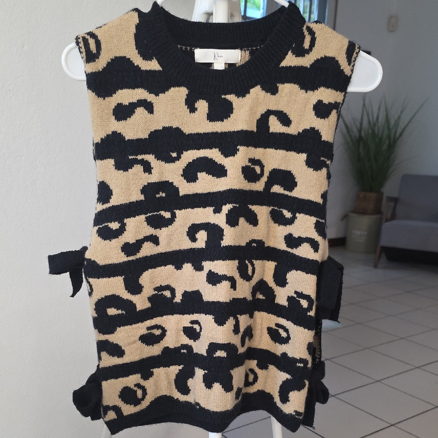 Stylish Black And Tan Patterned Sweater Vest